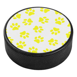Muster von Paws, Hundeschäften, gelben Pfoten Eishockey Puck