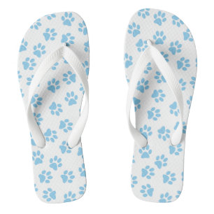 Muster von Pfoten, Hundeschäben, blaue Baby-Paws Flip Flops