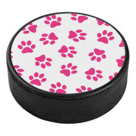 Muster von Pfoten, Hundeschrauben, rosa Pfoten Eishockey Puck