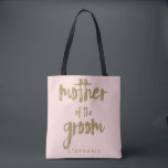 Mutter des Groom Gold Glitzer Blush PInk Tasche<br><div class="desc">Diese Totttasche der Mutter der Groom ist ideal für stolze Mütter, um ihre Sachen im Brautparty oder bei der Hauptveranstaltung zu Tasche. Diese rötlich-rosa Tasche ist mit einem goldenen Glitzer-Imitat auf der Vorderseite bedruckt. Personalisieren Sie diese Tasche mit dem Namen Ihres Hochzeitsmitglieds auf der Vorderseite und den Namen der Braut...</div>