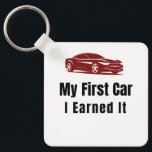 My First Car Keychain – I Earned It – Proud First  Schlüsselanhänger<br><div class="desc">Celebrate the pride of owning your very first car! This stylish keychain features the bold phrase "My First Car – I Earned It", perfect for anyone who worked hard to achieve their dream. Whether it's your first vehicle, a milestone purchase, or a gift for someone who just got their first...</div>