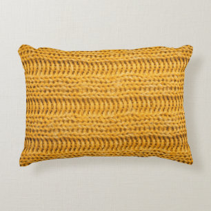 Nah aus gelbem gestricktem Hintergrund. Tr Dekokissen