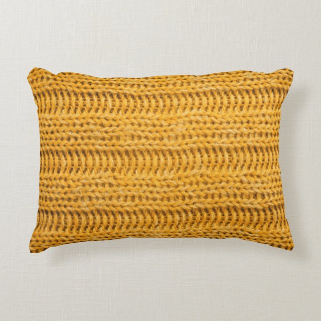 Nah aus gelbem gestricktem Hintergrund. Tr Dekokissen (Vorderseite)