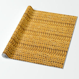Nah aus gelbem gestricktem Hintergrund. Tr Geschenkpapier
