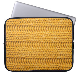 Nah aus gelbem gestricktem Hintergrund. Tr Laptopschutzhülle