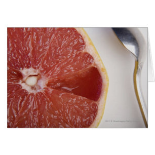 Nahe Orangenscheibe und Löffel