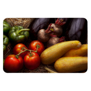 Nahrung - Paprikaschoten, Tomaten, Kürbis und Magnet