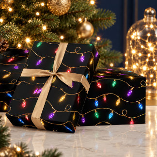 Nahtlose farbenfrohe Weihnachtsbeleuchtung Geschenkpapier