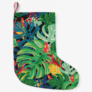 Nahtlose Grafik mit Blätter monstera und  Kleiner Weihnachtsstrumpf