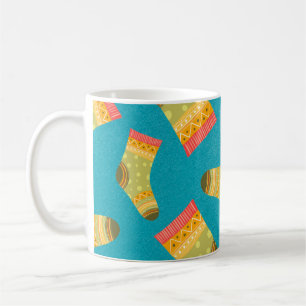 Nahtloses lineares Muster mit Socken. Die Illustra Kaffeetasse