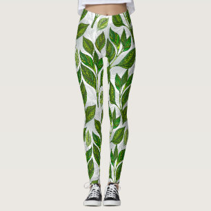 Nahtloses Muster mit Blätter aus grünem Tee Leggings