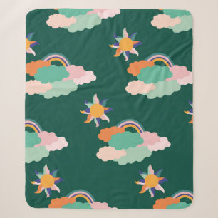 Nahtloses Muster mit bunten Wolken und Sherpadecke