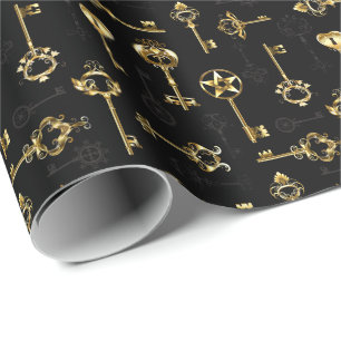 Nahtloses Muster mit Golden Keys Geschenkpapier