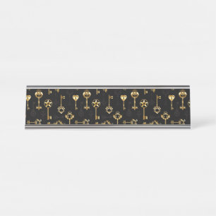 Nahtloses Muster mit Golden Keys Schreibtischnamensplakette