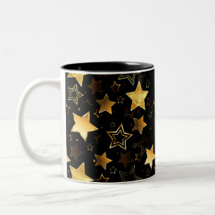 Nahtloses Muster mit goldenen Sternen Zweifarbige Tasse