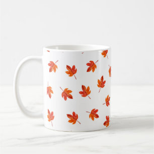 Nahtloses Muster mit Herbstblättern. Aquarellha Kaffeetasse
