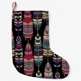 Nahtloses Muster mit Vogelfedern. Tribal Art a Kleiner Weihnachtsstrumpf