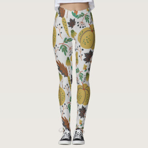 Nahtloses Muster tropischer Kürbis und Karotten Leggings