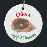 Name Niedlich Igel Baby First Christmas Keramik Ornament<br><div class="desc">Personalisiertes Baby erste Weihnachtsschmuck mit niedlich dekorierten Igel-Illustrationen auf weißem Hintergrund, mit kleinen goldfarbenen Schneeflocken. Baby Junge oder kleine Mädchen individuelle Name erste Weihnachtsdesign.</div>
