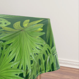 Nappe Feuilles de palmier vert tropical sur fond vert fo