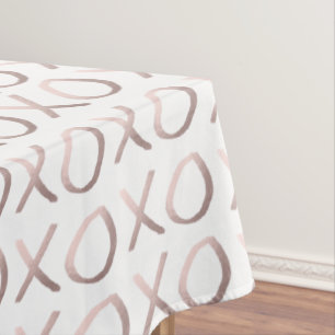 Nappe la typographie rose d'or de faux étreint et