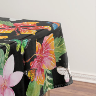 Nappe noire de fleurs tropicales