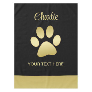 Nappe Paw chien brillant or sur arrière - plan noir