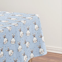 Têtes de lapin sur Motif bleu ciel