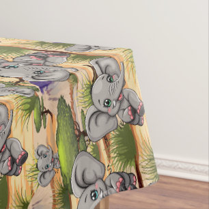 Nappe Un bébé éléphant qui sonne heureux dans la savane