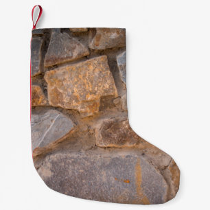 Natursteinabstrakte Mauermauerwerk, antike Zeit, Kleiner Weihnachtsstrumpf