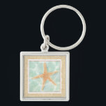Nautischer Starfish im Wasser Schlüsselanhänger<br><div class="desc">Dieses Gemälde von Chariklia Zarris lässt Sie sich jedes Mal, wenn Sie es sich ansehen, in eine Welt der Differenz verwandeln. Sie können sich am Strand vorstellen, auf der Suche nach Seestern oder im Sand zu spielen. Zarris's Image ist perfekt für diejenigen, die das Leben im Meer Liebe und wollte,...</div>