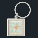 Nautischer Starfish im Wasser Schlüsselanhänger<br><div class="desc">Dieses Gemälde von Chariklia Zarris lässt Sie sich jedes Mal, wenn Sie es sich ansehen, in eine Welt der Differenz verwandeln. Sie können sich am Strand vorstellen, auf der Suche nach Seestern oder im Sand zu spielen. Zarris's Image ist perfekt für diejenigen, die das Leben im Meer Liebe und wollte,...</div>