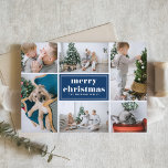 Navy Blue Retro Frohe Weihnachtsfoto Collage Feiertagskarte<br><div class="desc">Frohe Weihnachten! Senden Sie Ihre Urlaubssgrüße an Familie und Freunde mit dieser anpassbaren Weihnachtskarte. Es enthält Retro-Typografie und eine Foto-Collage-Vorlage. Personalisieren Sie dieses Foto Collage Weihnachtskarte durch Hinzufügen Ihrer Daten. Diese navy blaue Weihnachtskarte ist in anderen Farben und Cardstock erhältlich. Matching-Elemente sind verfügbar.</div>
