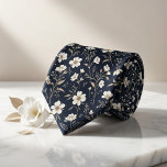 Navy Floral Krawatte<br><div class="desc">Elevate your style with poetic elegance using this breathtaking midnight navy necktie blooming with delicate florals! A graceful pattern of petite white blossoms, shimmering gold and beige foliage, slender stems, tiny leaves, and airy botanical sprigs creates a luxurious, vintage-inspired meadow scene against a deep, rich navy background. This sophisticated yet...</div>