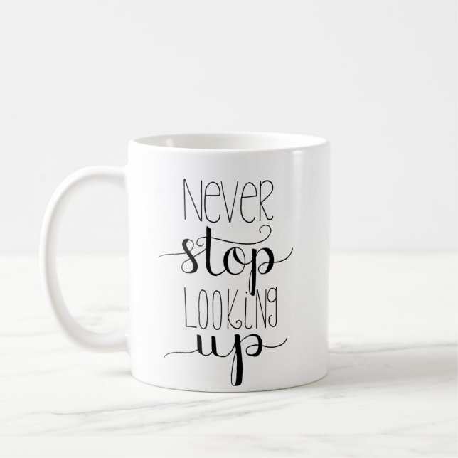 Ne cessez jamais de rechercher la tasse Main-En (Gauche)