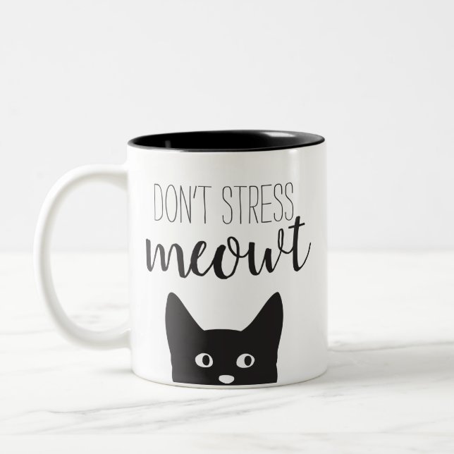 Ne soumettez pas à une contrainte la tasse de (Gauche)