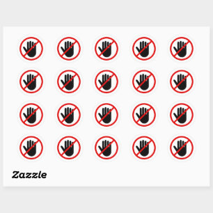 Ne touchez pas les autocollants avec un signe inte