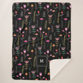 Neon Wildblumen auf schwarz, mit Monogramm Sherpadecke