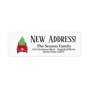 Neue Adresse Red Car mit Weihnachtsbaum