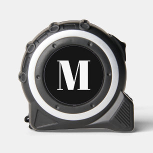 Neuer, weißer, monogramm-schwarzer Anfangsbuchstab Maßband