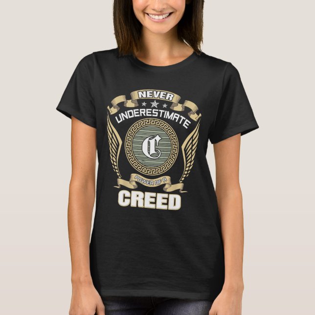 NEVER_UNDERESTIMATE_POWER_OF_A_CREED T-Shirt (Vorderseite)