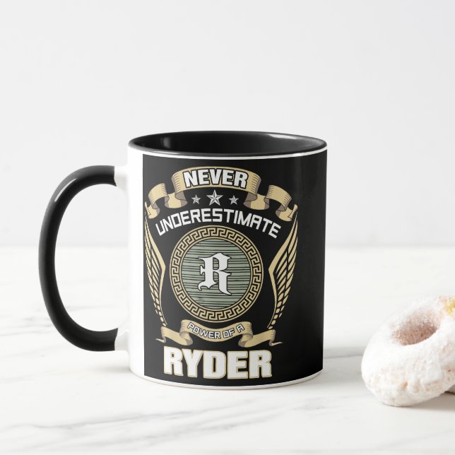 NEVER_UNDERESTIMATE_POWER_OF_A_RYDER TASSE (Mit Donut)