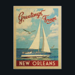 New Orleans Postcard Sailboat Vintag Louisiana Postkarte<br><div class="desc">Diese Gruß aus New Orleans Louisiana Vintage nautische Design bietet ein Boot auf dem Wasser mit Möwen und einen blauen Himmel gefüllt mit prächtigen puffigen weißen Wolken.</div>