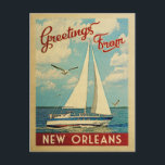 New Orleans Postcard Sailboat Vintag Louisiana Postkarte<br><div class="desc">Diese Gruß aus New Orleans Louisiana Vintage nautische Design bietet ein Boot auf dem Wasser mit Möwen und einen blauen Himmel gefüllt mit prächtigen puffigen weißen Wolken.</div>