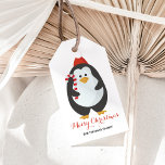 Niedlich Penguin Merry Christmas Candy Cane Geschenkanhänger<br><div class="desc">Süße Figur Weihnachtsgeschenk-Tag zeigt den Satz "Frohe Weihnachten" in einem extravaganten Skript und einen niedlichen Pinguin mit einem Bonbonbon Stock und Weihnachtsmannmütze. Dieses Tag erlaubt benutzerdefinierten Text,  den Sie personalisieren können. Das Bonbonmuster auf der Rückseite betont den feinen Bonbonstock vorne und erlaubt einen großen Platz für "nach" und "nach".</div>