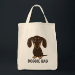 Niedlich Schokolade Dackel Dackel Hund Doggie Tragetasche<br><div class="desc">Ein bezaubernder, glatt gestrichener Dackel Welpe, der nach oben schaut. Der Text "Doggie Bag" kann mit Ihrem eigenen Namen oder Slogan personalisiert werden. Eine niedliche Dackel Hundesacktasche, ideal zum Shoppen von Lebensmitteln oder Haustierzubehör. Diese lustige Würstchen Hund Cartoon wiederverwendbare Tasche ist ein perfektes Geschenk für jeden, der einen Würstchen Liebe...</div>