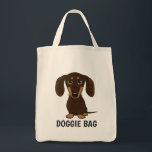 Niedlich Schokolade Dackel Dackel Hund Doggie Tragetasche<br><div class="desc">Ein bezaubernder, glatt gestrichener Dackel Welpe, der nach oben schaut. Der Text "Doggie Bag" kann mit Ihrem eigenen Namen oder Slogan personalisiert werden. Eine niedliche Dackel Hundesacktasche, ideal zum Shoppen von Lebensmitteln oder Haustierzubehör. Diese lustige Würstchen Hund Cartoon wiederverwendbare Tasche ist ein perfektes Geschenk für jeden, der einen Würstchen Liebe...</div>
