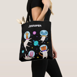 Niedliche Astronautentiere schwimmen im Weltraum Tasche