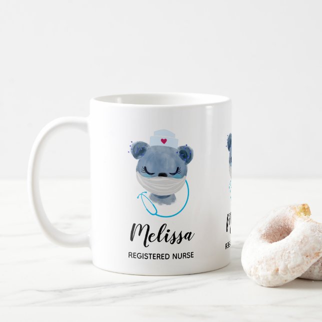 Niedliche Bärennahrung mit einer medizinischen Mas Kaffeetasse (Mit Donut)
