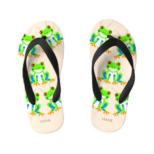 Niedliche Baumfrösche im Gras Kinderbadesandalen